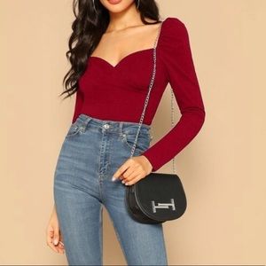 Red blouse. Never been worn